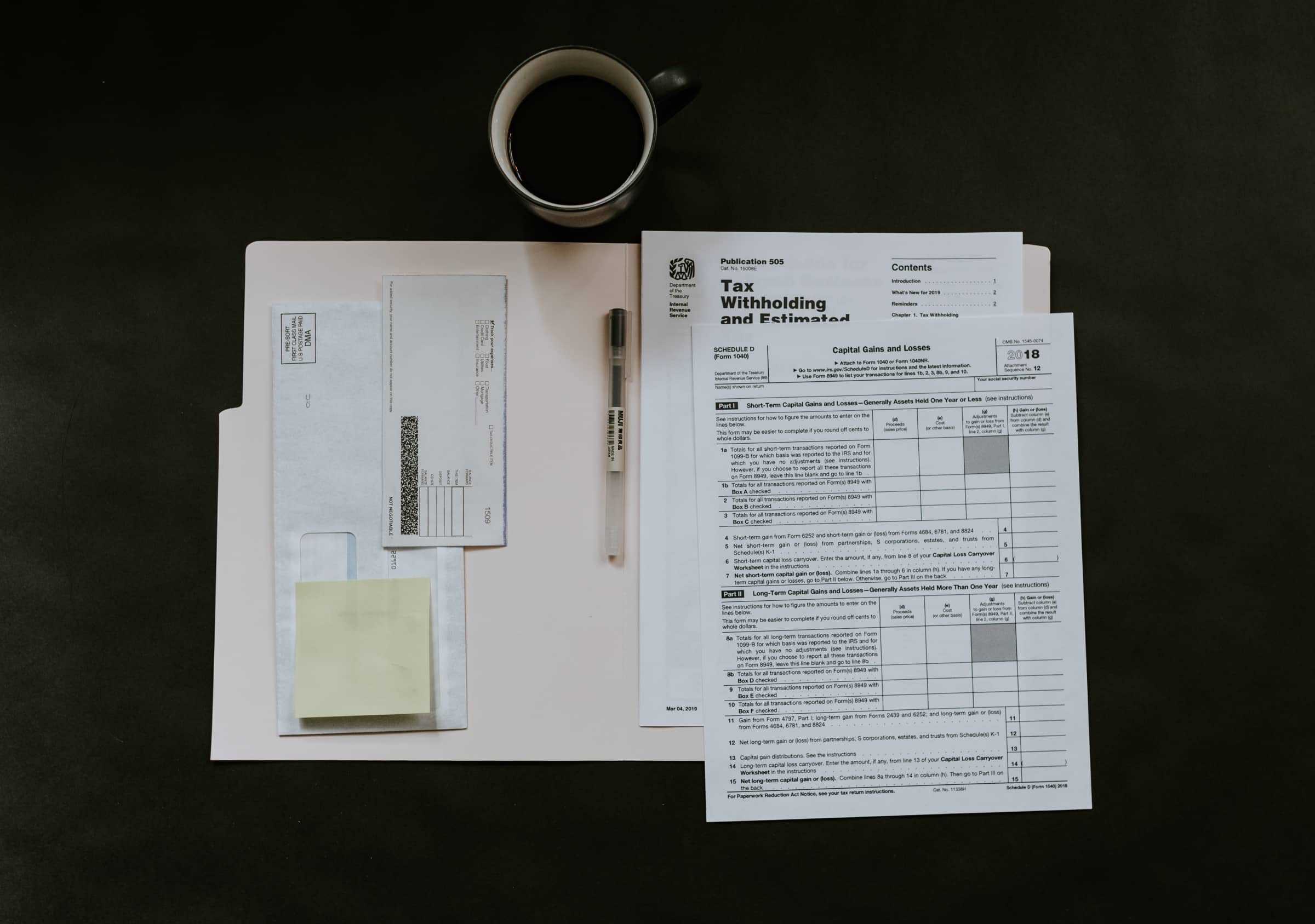 IRS tax forms including Publication 505 on withholding and estimated taxes and Schedule D for capital gains and losses